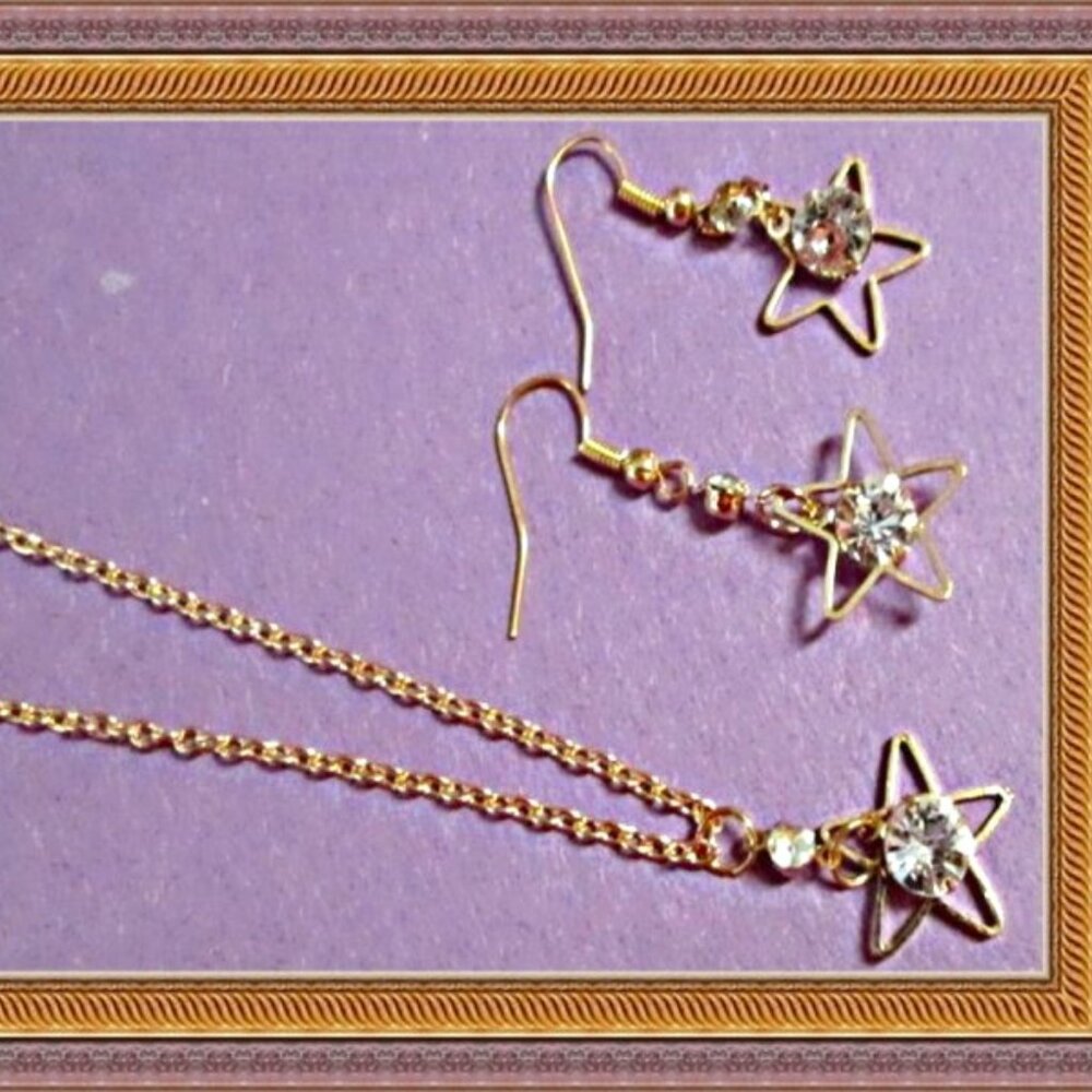 Gold Tone Star With Clear Crystals Dangle Earring & Necklace Jewelry Set